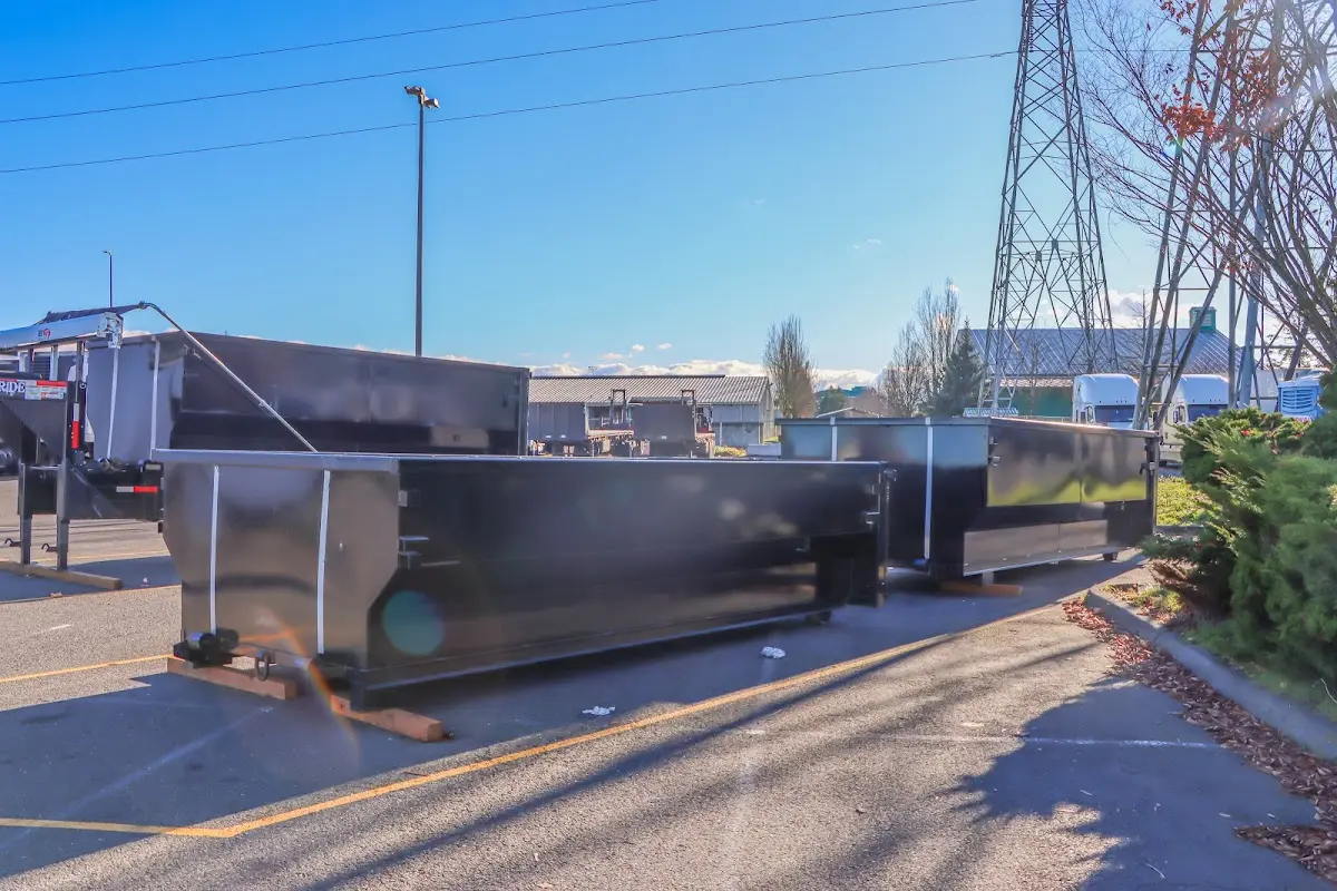Roll-off dumpster ready for waste disposal at job site for Yard Waste Dumpster Rental in Cascades